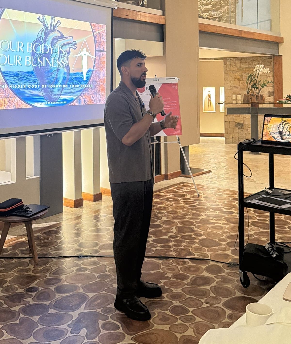 Chris speaking at a Your Body Is Your Business talk